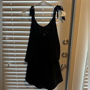 Super cute romper with bows, great material